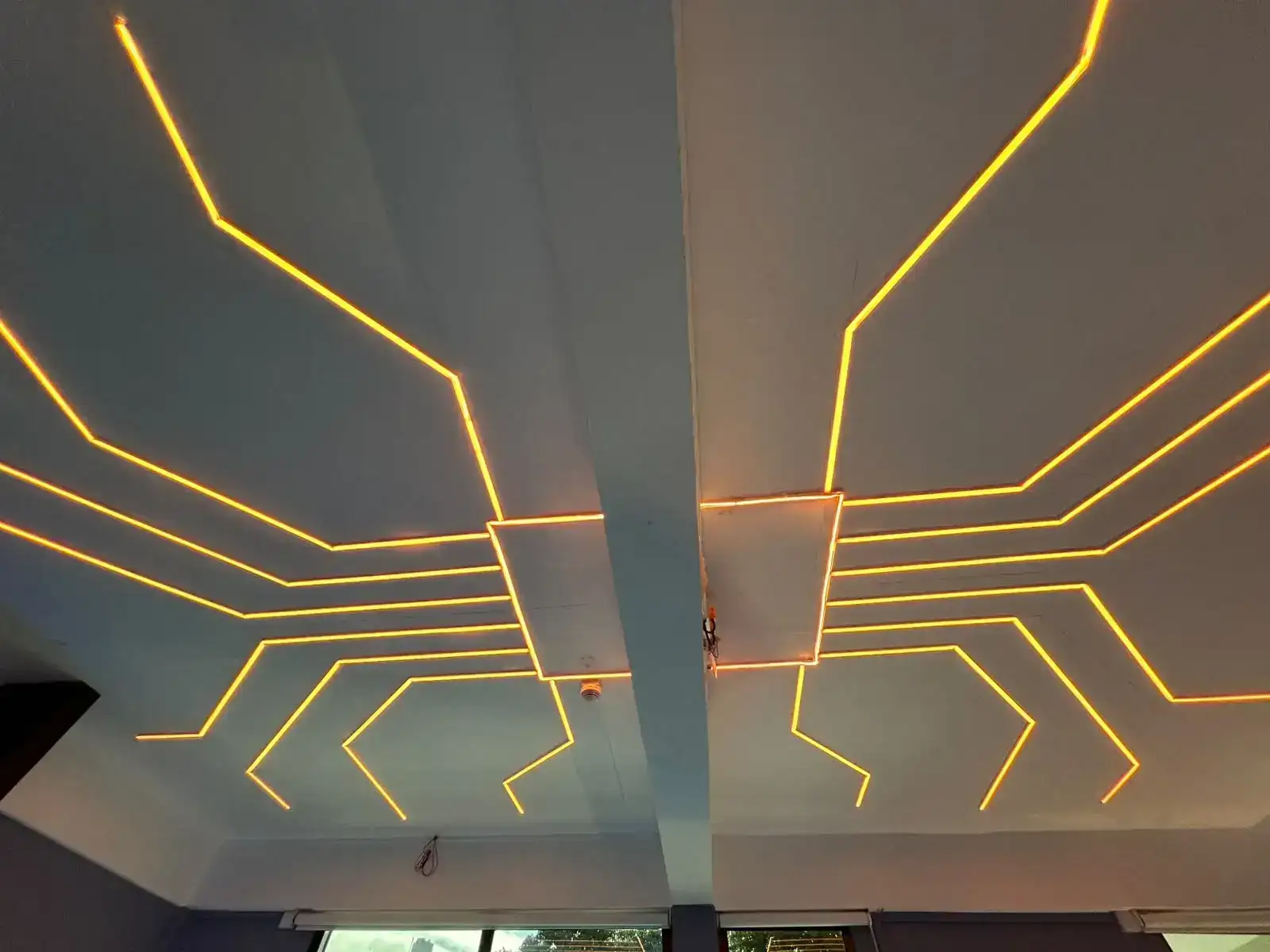 Wide view of geometric linear ceiling lighting
